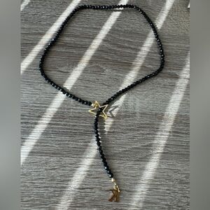 Anthropologie Black Beaded Necklace with Gold Star and Initial Charm